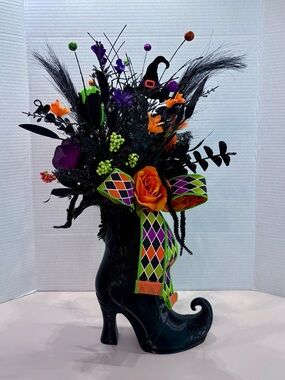 Black Witch Boot Floral Arrangement with Orange & Purple Accents